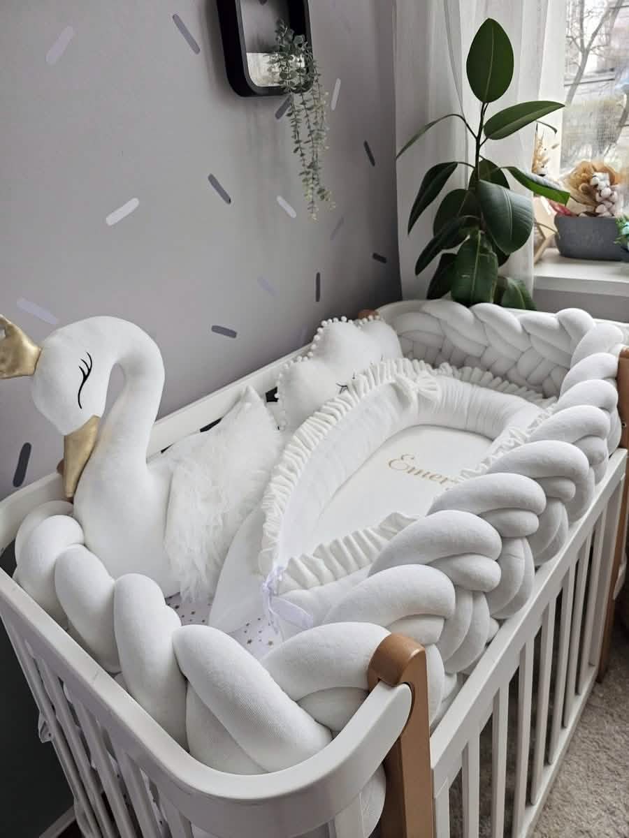 Premium creamy baby crib bedding set with braided crib bumper. KARI studio