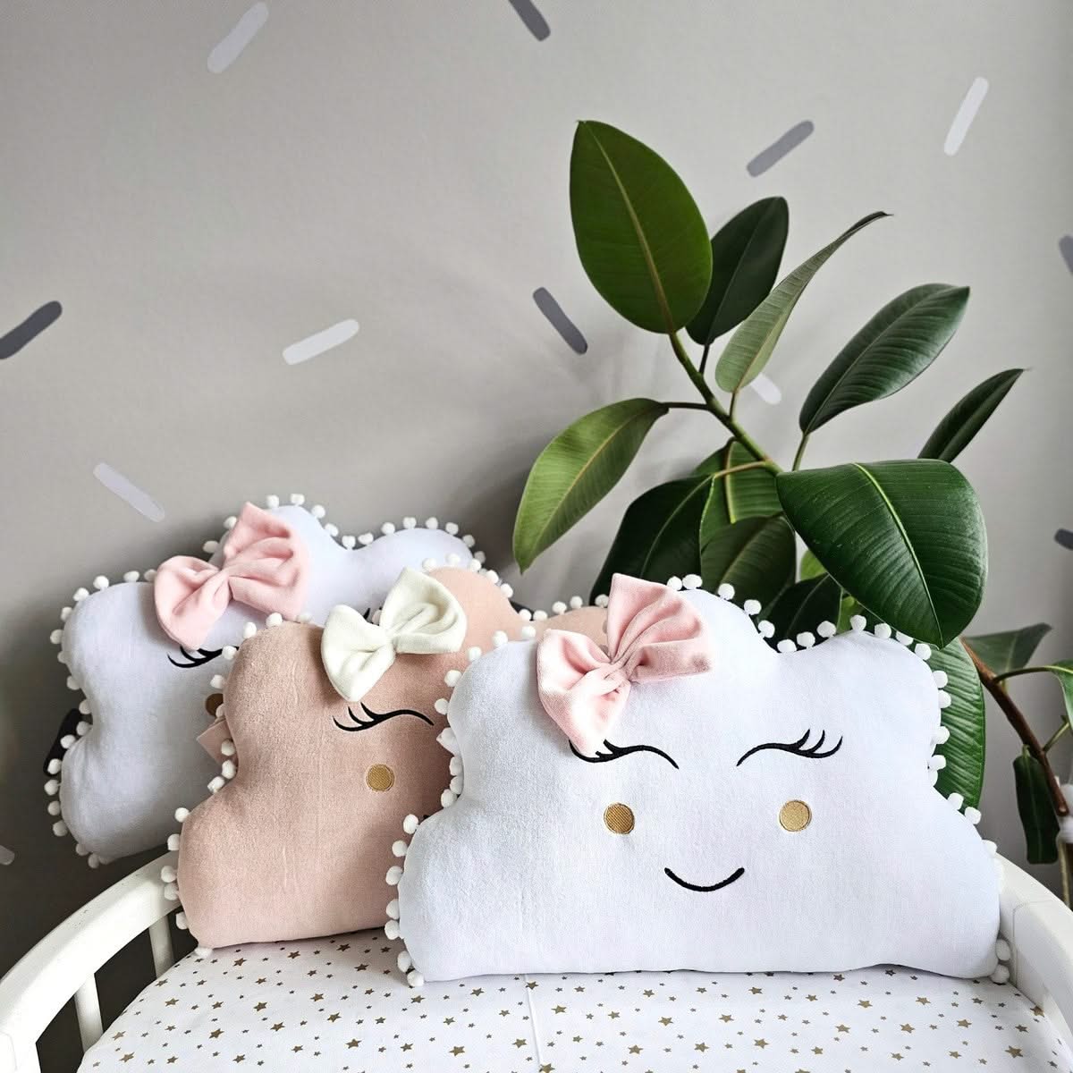 Baby pillow cloud with face.