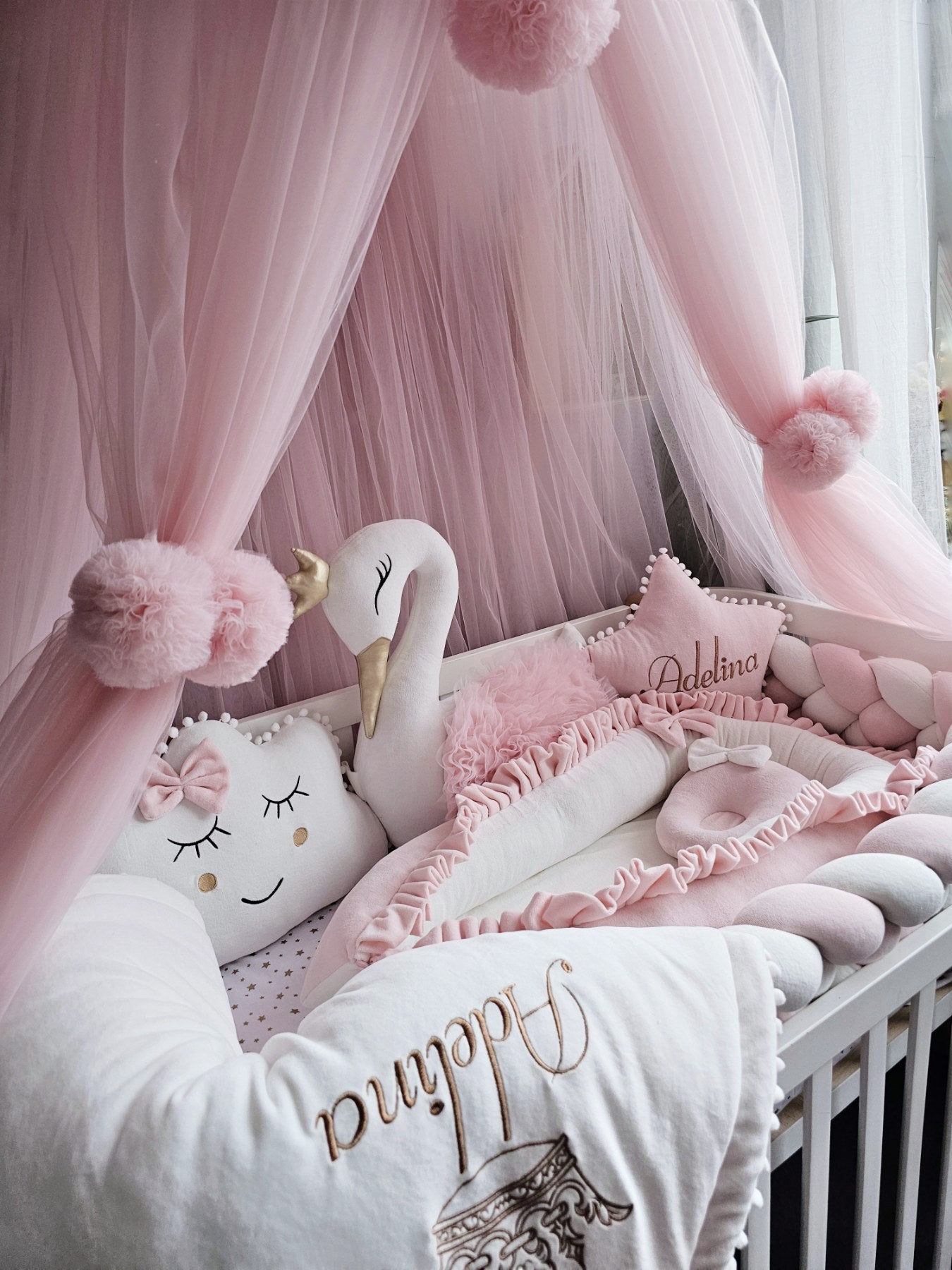 Luxury baby bedding light pink with braided crib bumper. KARI studio