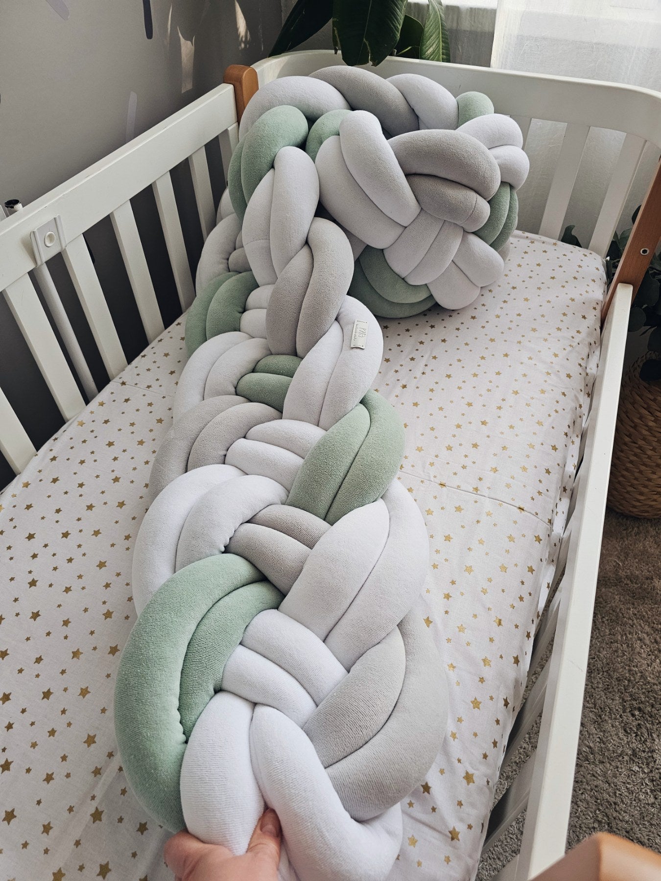 Gender neutral baby bedding set with braided crib bumper green. KARI studio